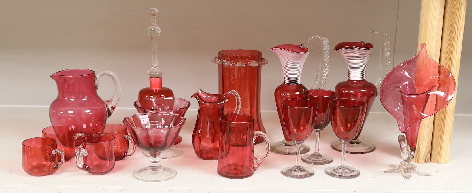 A quantity of various late 19th/early 20th century cranberry glass